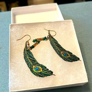 Beautiful and unique delicate earrings. Never worn.